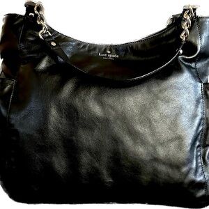 Kate Spade Larger than life shoulder bag black with polka dots. Classic look!!